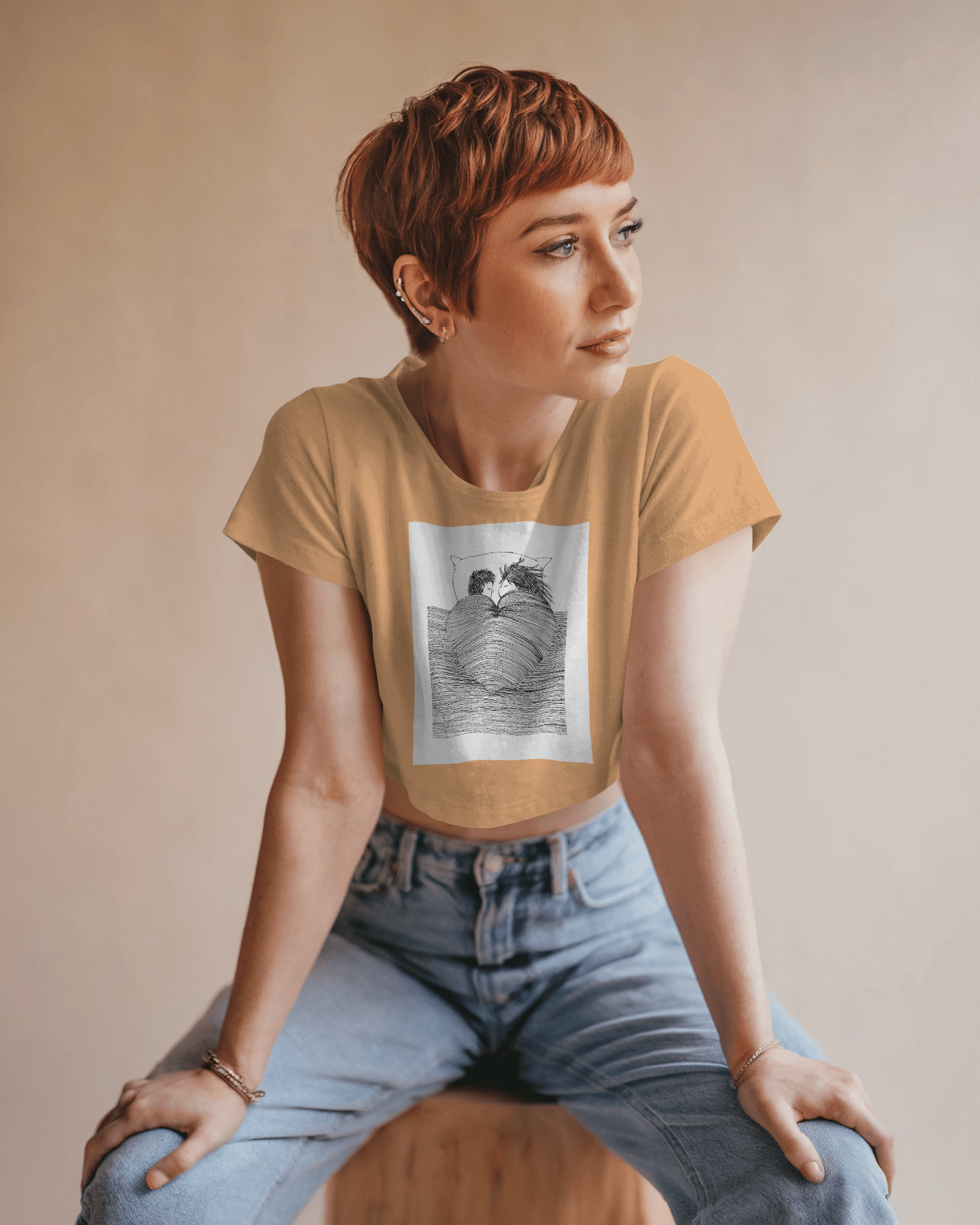 Crop top featuring minimal line-art sleeping couple illustration – Tanabana A Manoram.