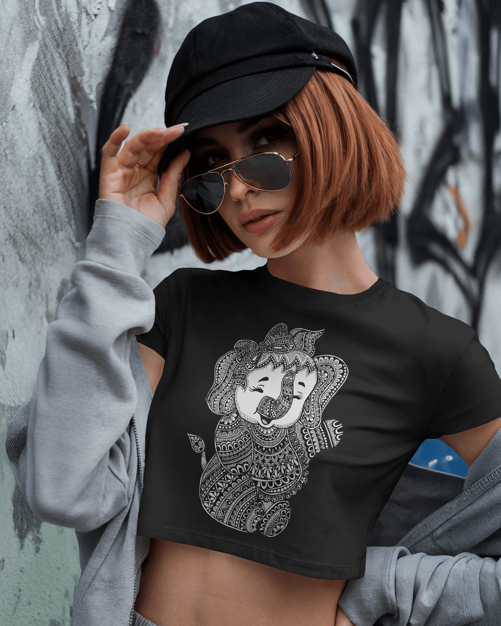Woman wearing black crop top with mandala Baby Ganesha illustration – Tanabana A Manoram.
