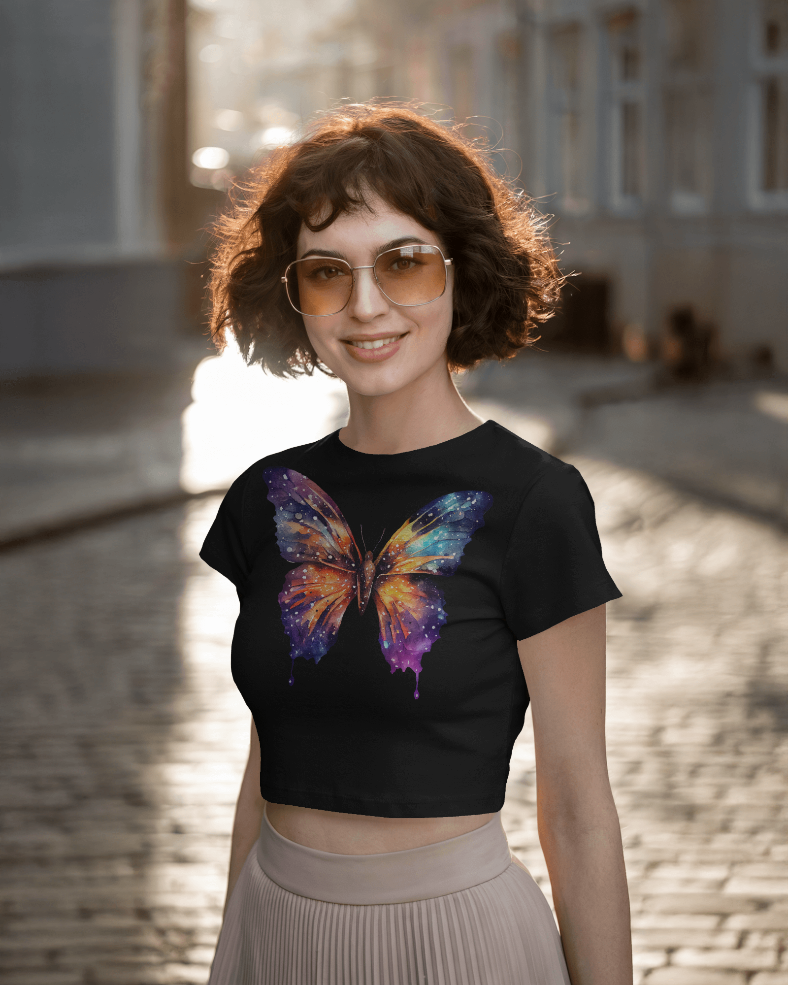 crop top with colorful galaxy butterfly print worn by a woman – Tanabana A Manoram.