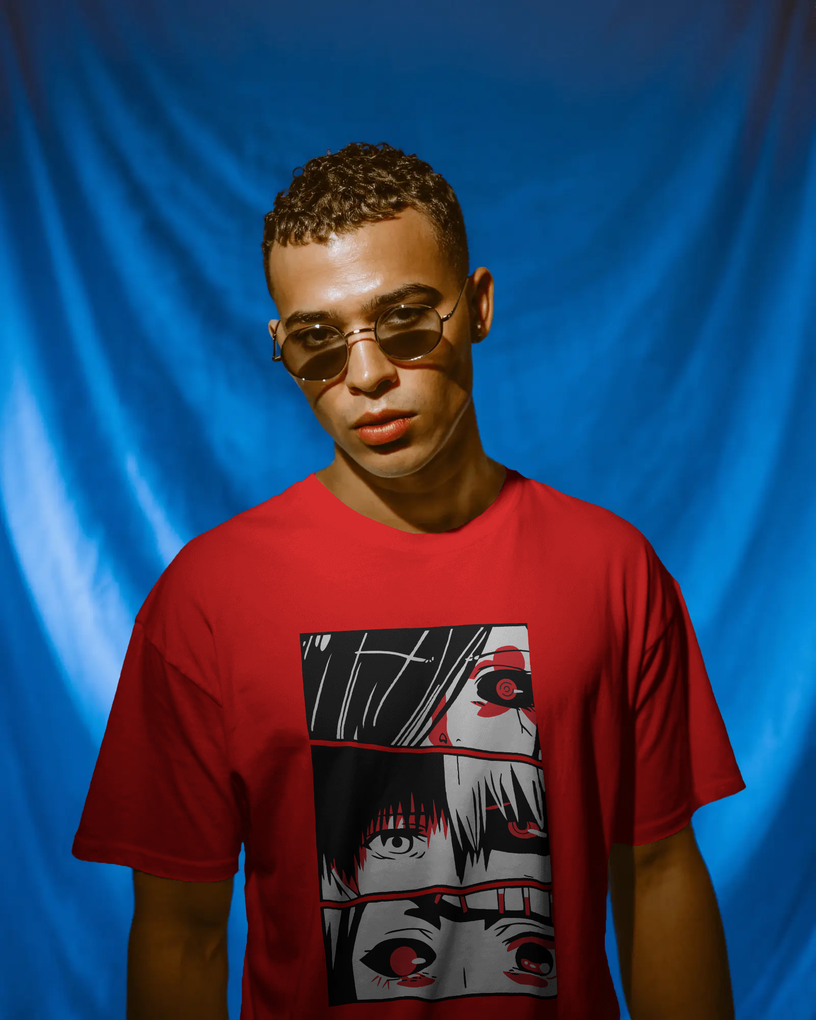 oversized T-shirt with intense anime-style eye artwork worn by a man – Tanabana A Manoram.