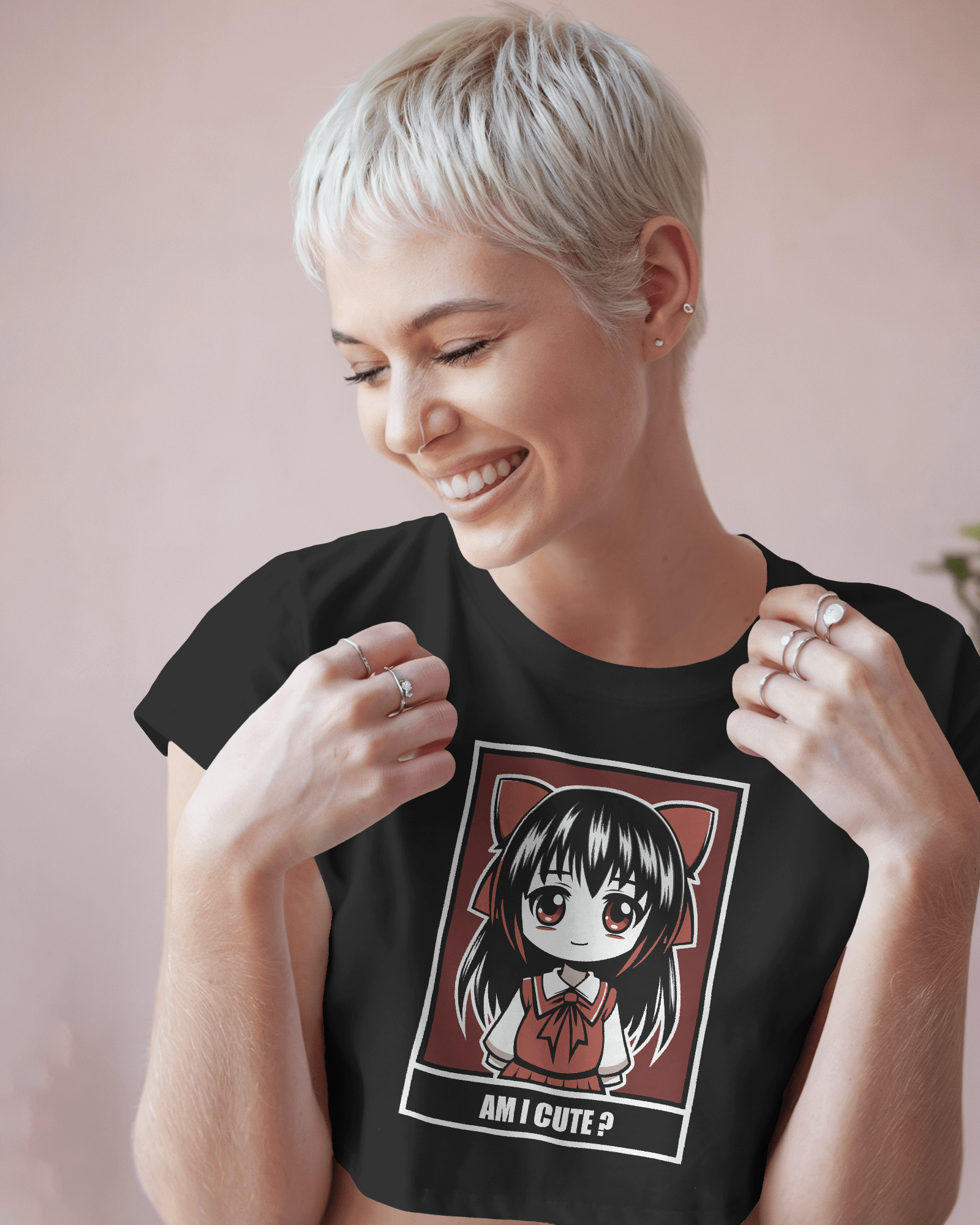 Woman wearing a black t-shirt with an anime character graphic and text by Tanabana A Manoram
