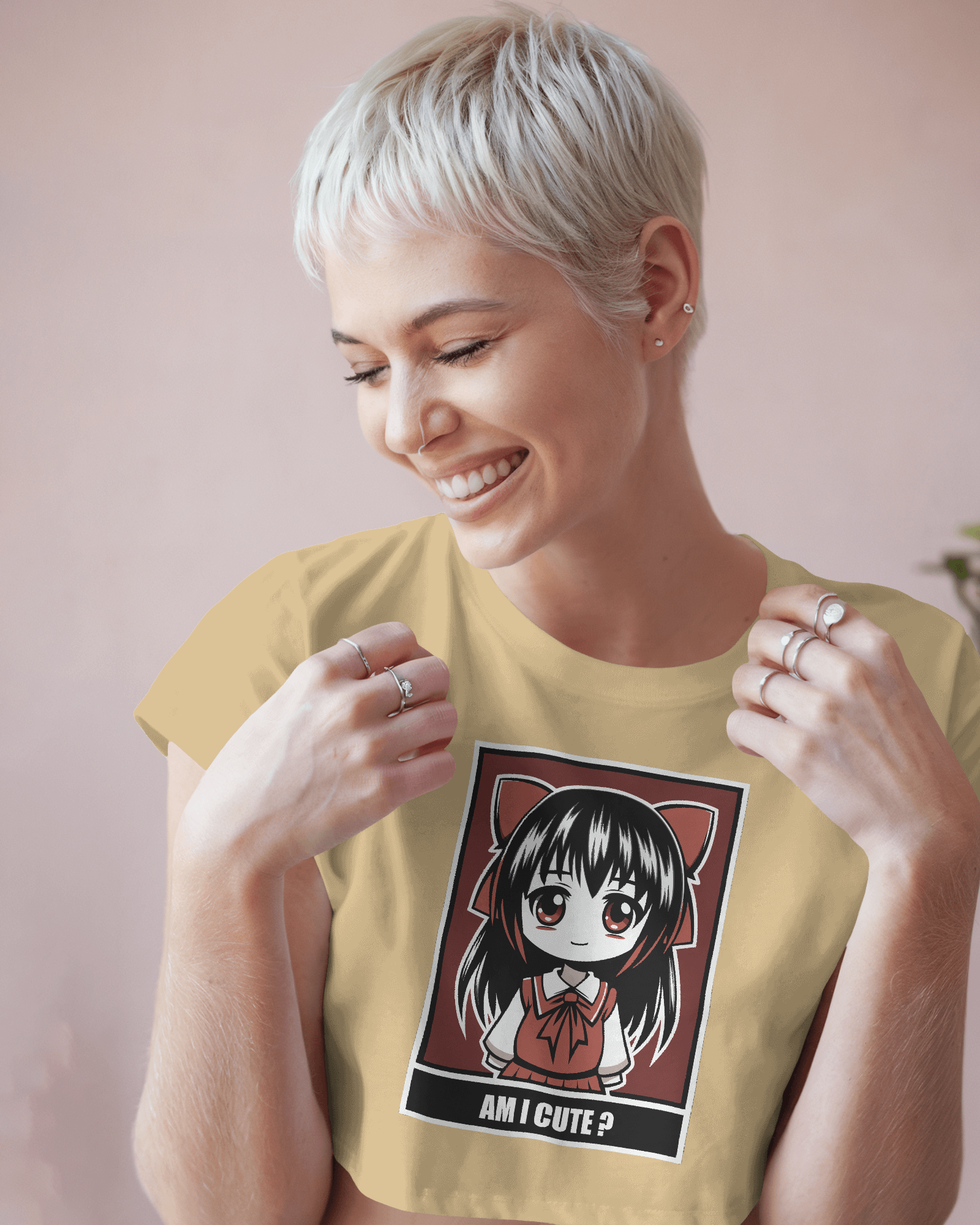 Woman wearing a yellow t-shirt with an anime character graphic and text by Tanabana A Manoram