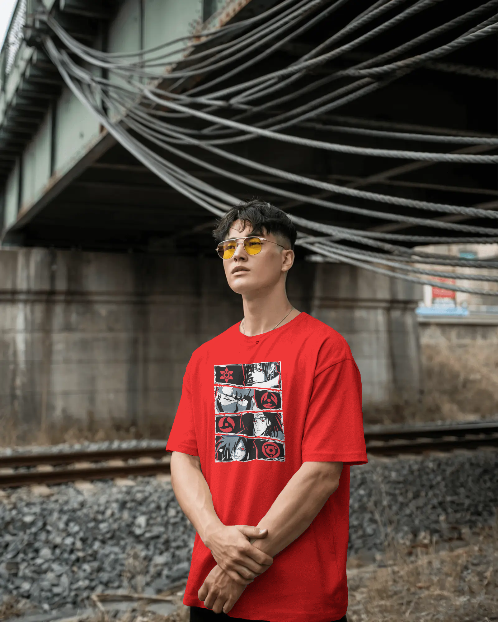 oversized t-shirt with red-eye manga panel artwork worn by a man – Tanabana A Manoram.