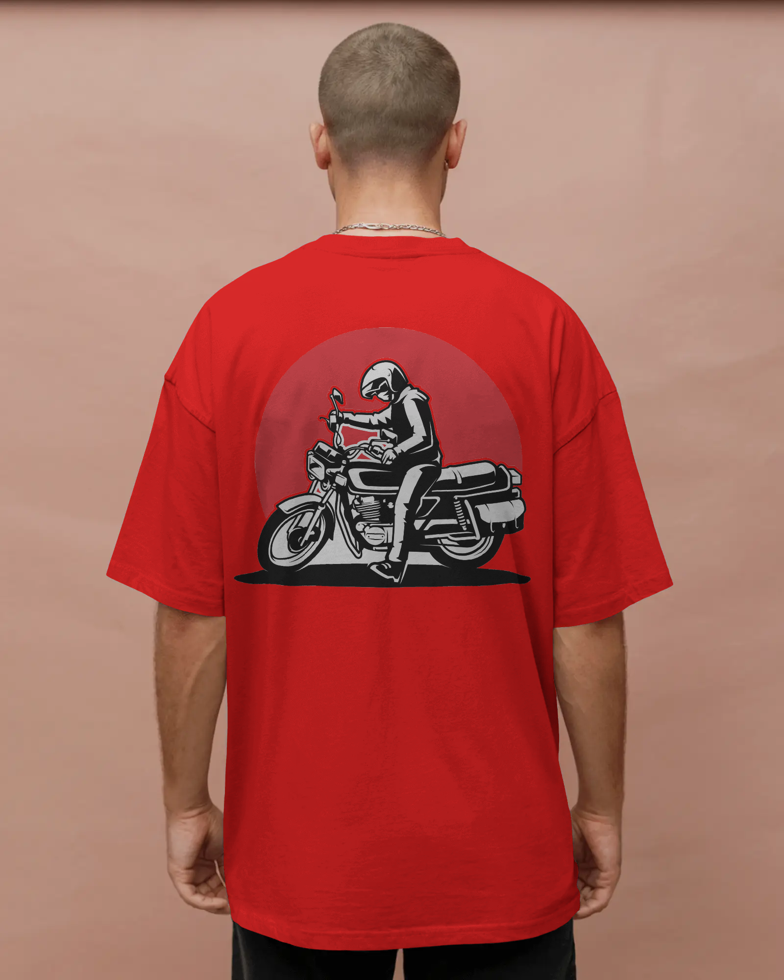 Person wearing a red t-shirt with a graphic of a person on a motorcycle on the back, against a brown background by Tanabana A Manoram