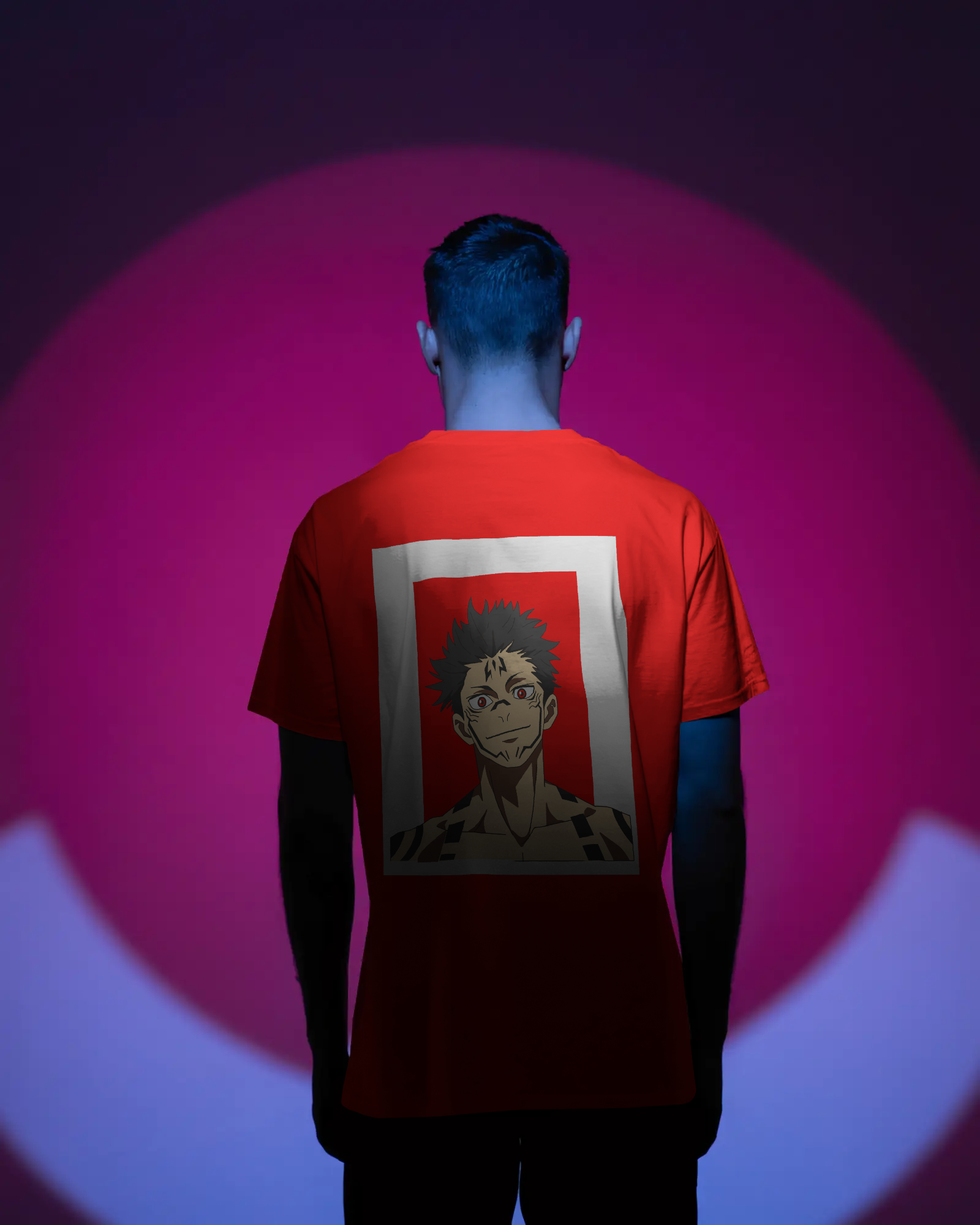 Person wearing a red t-shirt with a graphic design on the back against a pink and purple gradient background