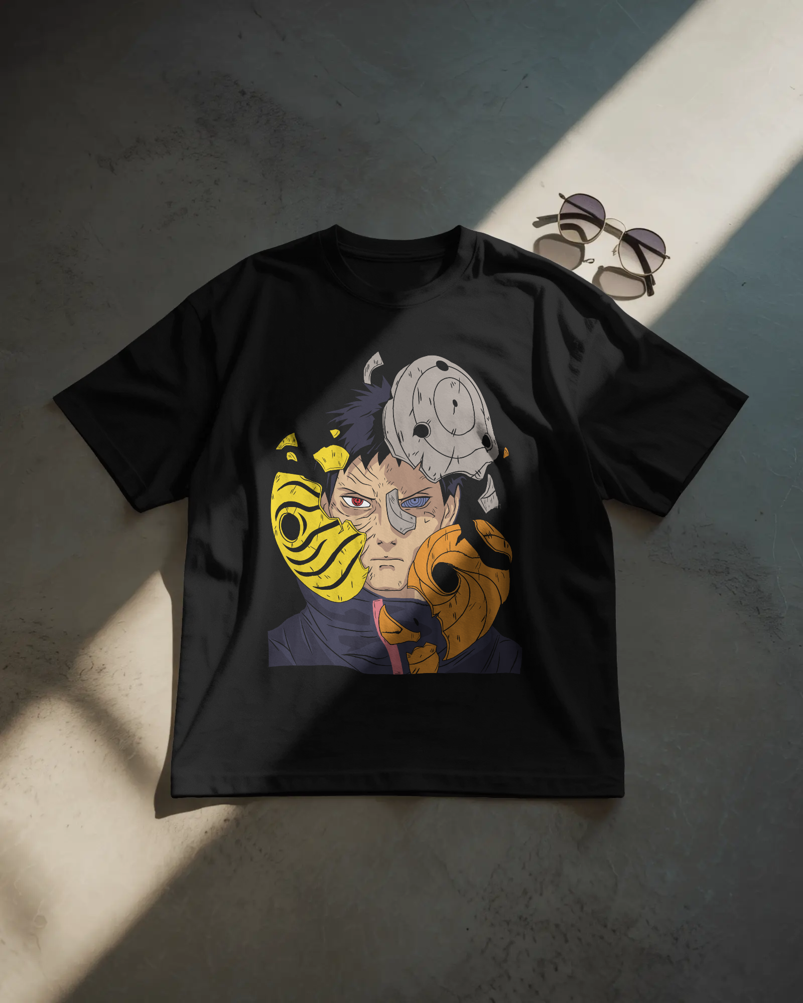 Black oversized t-shirt with a colorful Obito uchiha design on front by Tanabana A Manoram