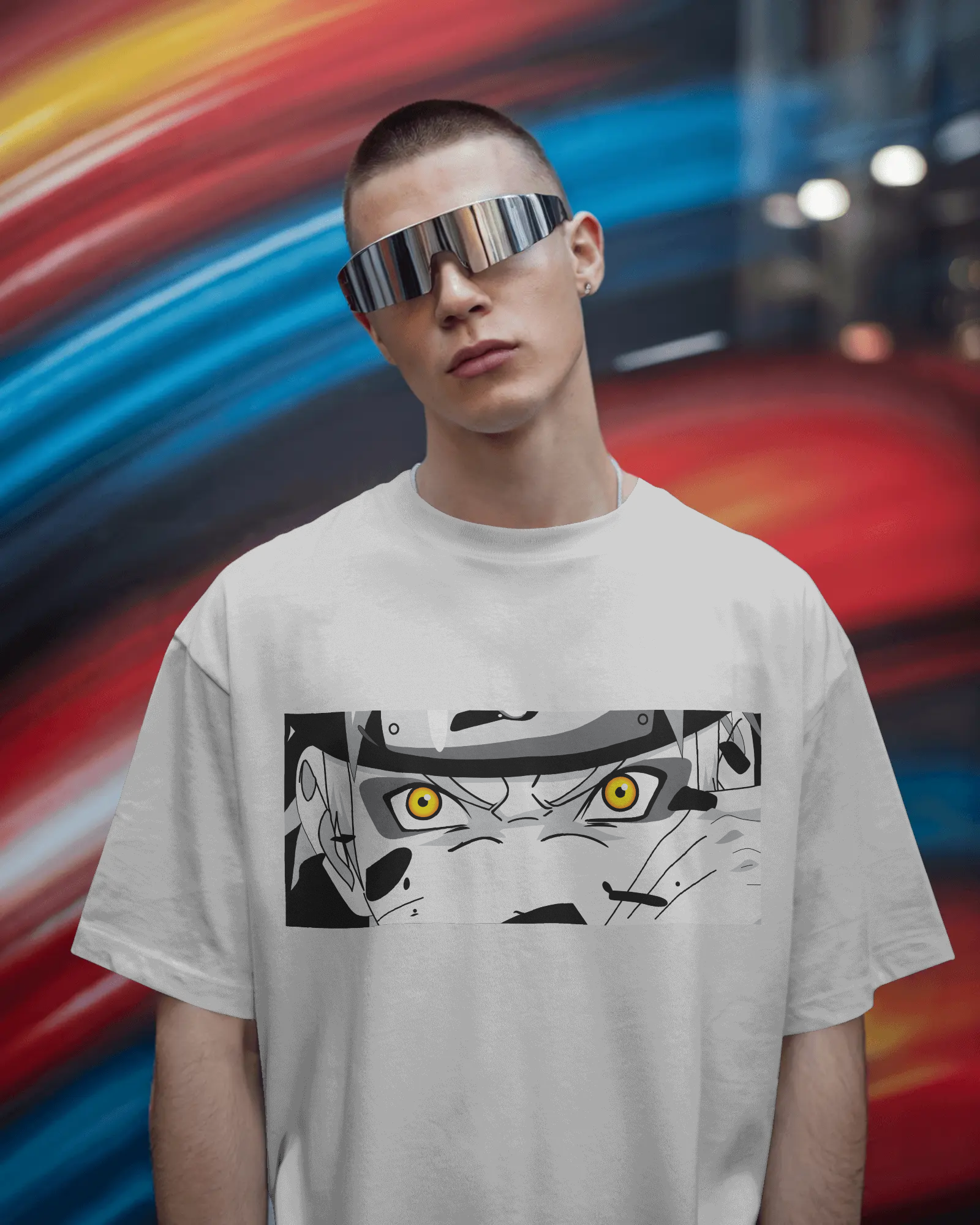 White oversized t-shirt with a colorful Naruto eyes design on front by Tanabana A Manoram