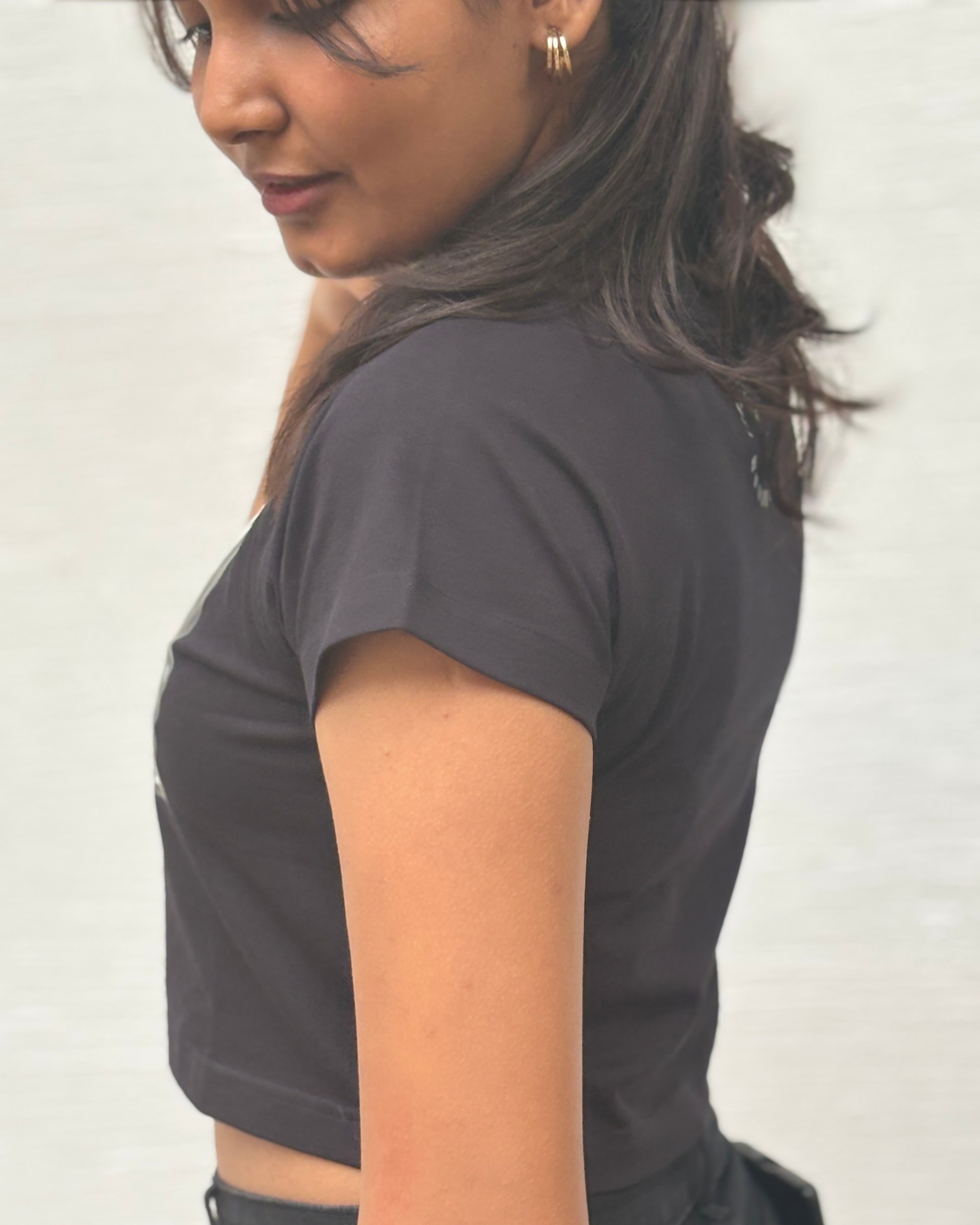 Close-up of fabric texture on black Nazar Na Lage crop top