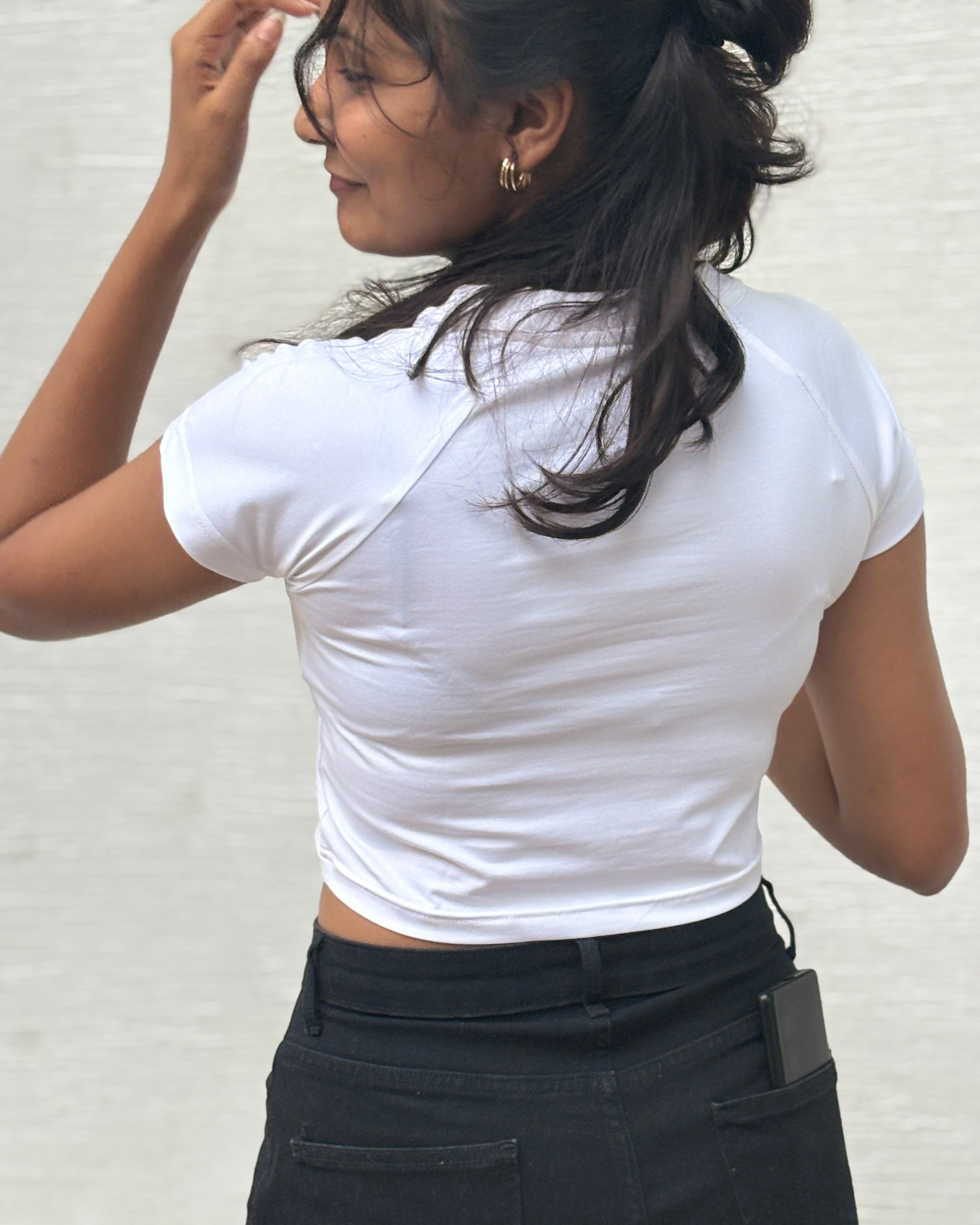 Back view of Nazar Na Lage print on white crop top