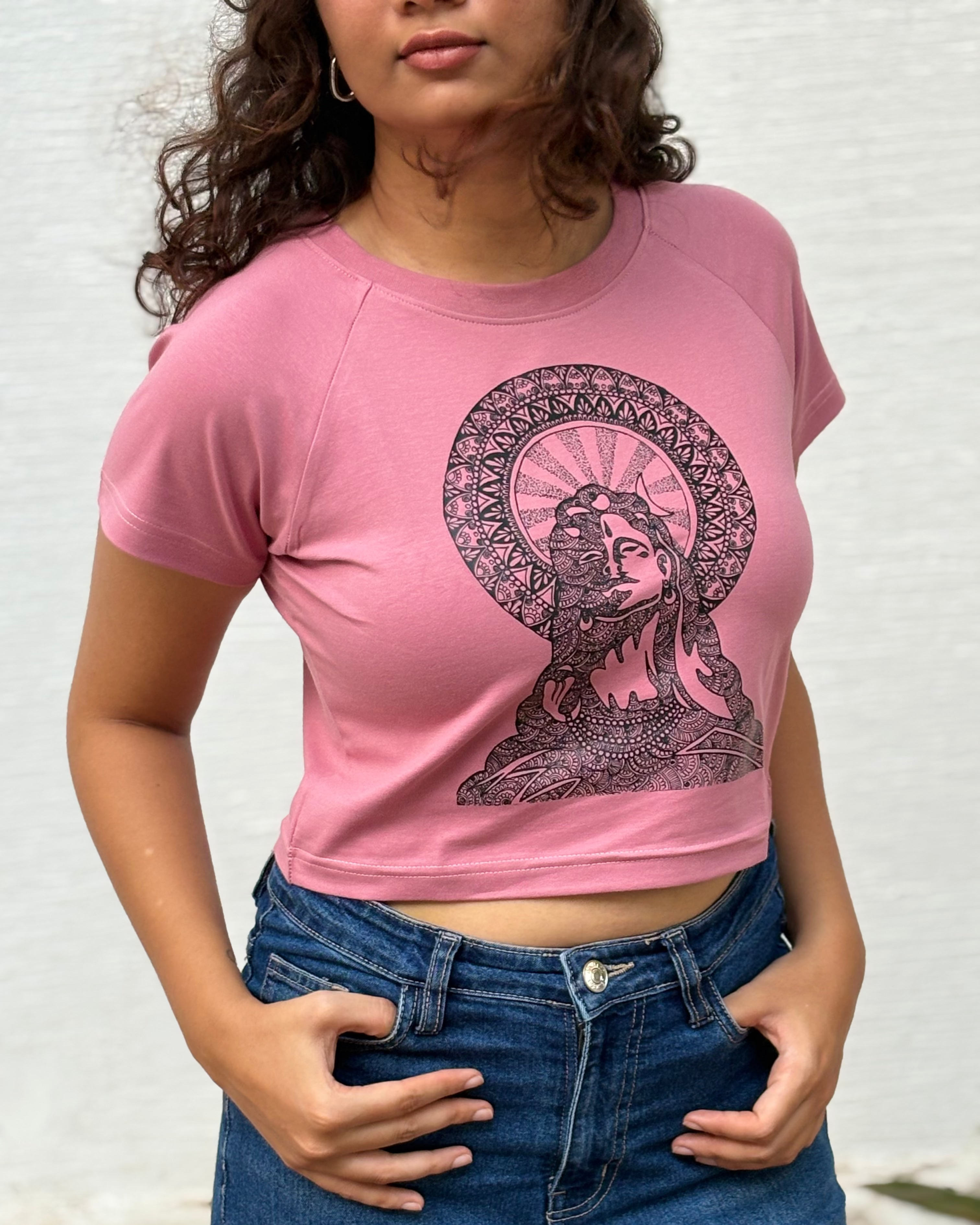 Hand-drawn Lord Shiva meditating inside an intricate mandala halo, side view onion colour t-shirt worn by model - Tanabana A Manoram