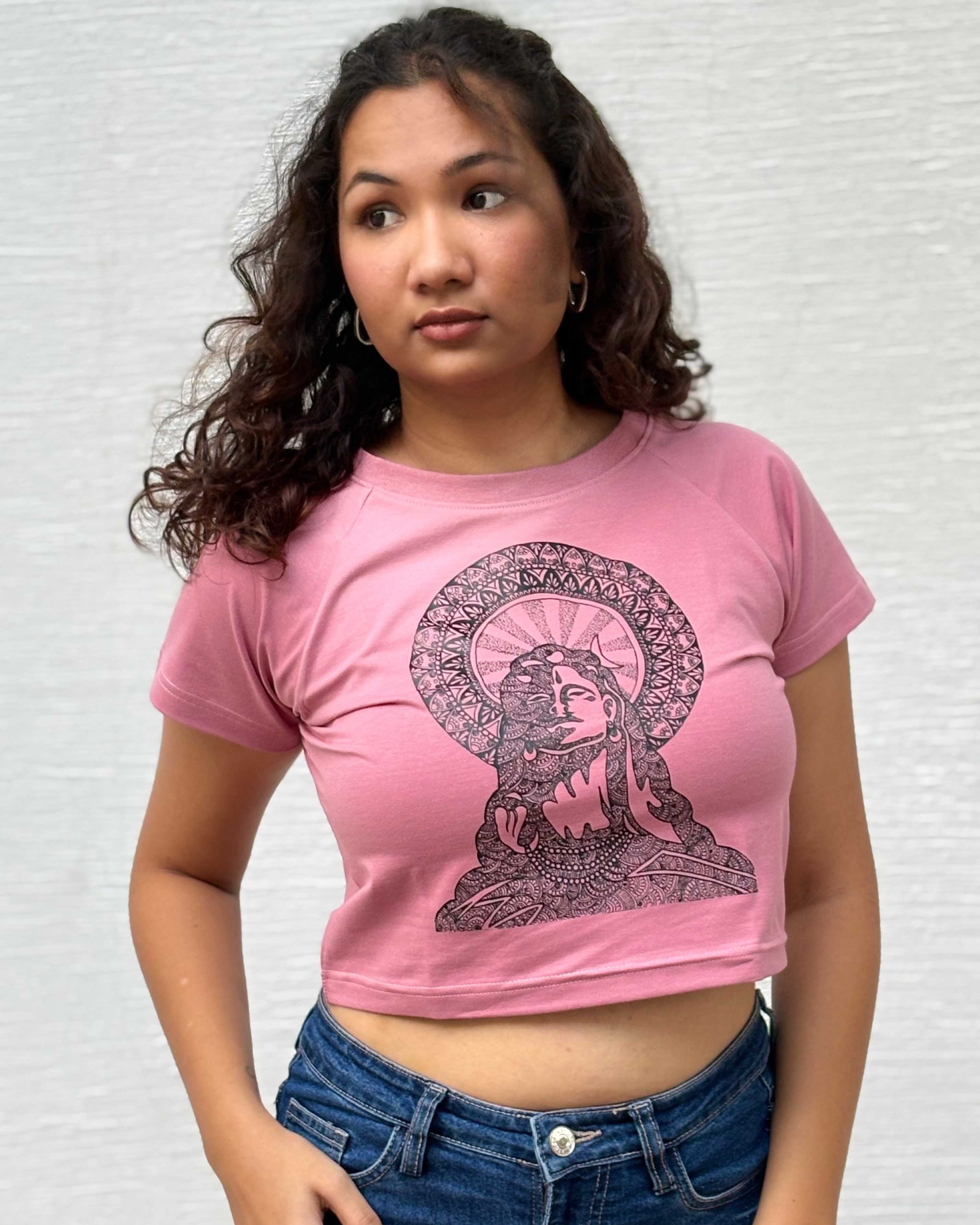 Hand-drawn Lord Shiva meditating inside an intricate mandala halo, front view onion colour t-shirt worn by model - Tanabana A Manoram